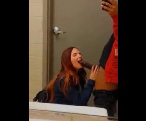 Snowbunny sucking bbc in public bathroom